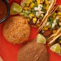 Fish Taco Plate · Served by order of three tacos, tilapia filets cooked on the grill accompanied with rice and...