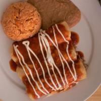 Enchiladas · Three corn tortillas stuffed with your choice meat, vegetables or cheese, topped with the sa...