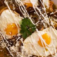 Chilaquiles · Corn tortilla chips simmered with the sauce of your choice (tomatillo/guajillo/chipotle) top...
