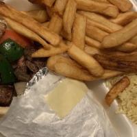 Beef Souvlaki Plates · Served with choice of two sides and pita bread.