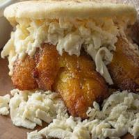 Platano Y Queso · Arepa stuffed with sweet plantain and queso fresco.