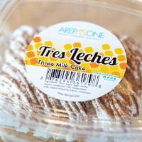 Tres Leches · Sponge cake soaked in three milks, topped with meringue and cinnamon.