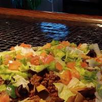 Nachos Grande + · order of nachos with your choice of chicken, steak or shrimp, topped with olives, jalapenos,...