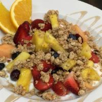 Granola Parfait + · served over low-fat yogurt and drizzled with honey and topped with fresh fruit and berries