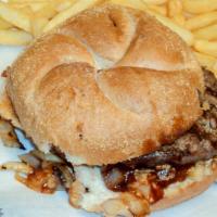Texas Burger · With sauteed onions, BBQ sauce and Cheddar cheese.