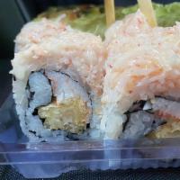 Snow Mountain Roll · Ten pieces. Tempura shrimp and crab meat inside, topped with mixed of king crab, snow crab, ...