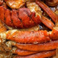 Combo C · 1/2 lb Snow Crab Legs 
1/2 lb Shrimp (Head-off)
1 Lobster Tail (6 oz)