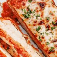 Chicken Parmesan  · Lightly Breaded | Fresh Mozzarella | Marinara | Fresh Mafalde Pasta