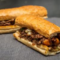 Steak & Cheese · Shaved Steak, Cheese, and add Mushrooms, Onions, and/or Peppers