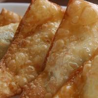 Crab Rangoon · Favorite. Six pieces. Cream cheese and crabmeat filling with sweet sour sauce on the side.