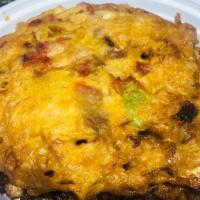 Egg Foo Young · Fried omelet with choice of meat or vegetables. Gravy on the side.