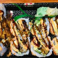 Spider Roll · Spicy. Eight pieces. Butter fried soft shell crab, avocado and cucumber. Spicy mayo, eel sau...