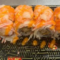 Sr15. American Dream Roll 🇺🇸 · Rock shrimp tempura inside, topped with crab stick, shrimp in sweet mayo sauce.