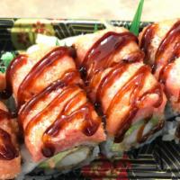 Sr14. Kyoto Roll · Spicy. Shrimp tempura and avocado inside, topped with spicy tuna in BBQ eel sauce.
