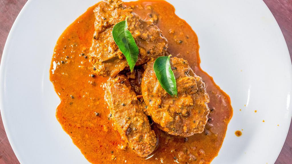 Kerala Chicken Curry · Chicken cooked with our special spice blend