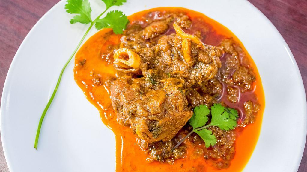 Goat Curry · Goat cooked in our special blend of spices