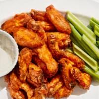Wings · Double fried and tossed or served SOS (sauce on side) with one of our scratch-made sauces.