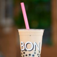 Milk Bubble Tea · Contains milk. Creamy and sweet iced black tea with tapioca pearls.