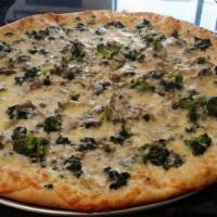 Triple Cheese Vegetable Pizza · Mozzarella, provolone, broccoli, fried onions, spinach, mushrooms, and Swiss cheese.