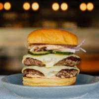 Ghostburger · American cheese, red onion, dill pickles, special sauce - photo shows a double