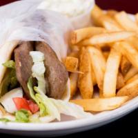 Greek Gyro · your choice of grilled lamb & beef or chicken, wrapped in grilled pita, lettuce, tomato, tza...
