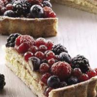 Mixed Berry Cake · Shortcrust pastry base filled with pastry cream, topped with a layer of sponge cake and lavi...
