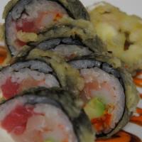 Tnt Roll · Spicy. Kanikama, avocado, tuna, salmon, masago, and cream cheese.