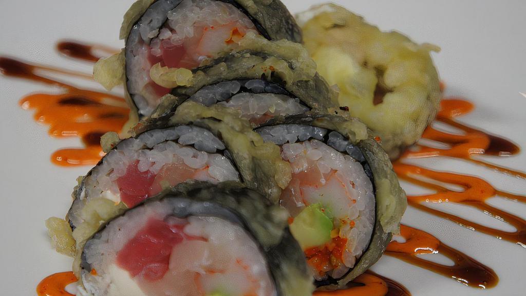 Tnt Roll · Spicy. Kanikama, avocado, tuna, salmon, masago, and cream cheese.