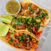 Pulled Pork Tacos · Corn tortillas, Mexican blend cheese, fresh pico de gallo, shredded lettuce, lime and salsa ...