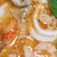 Spicy Vietnamese Seafood Curry · A taste of the sea with shrimp, squid, and crab meat. Choice of rice.