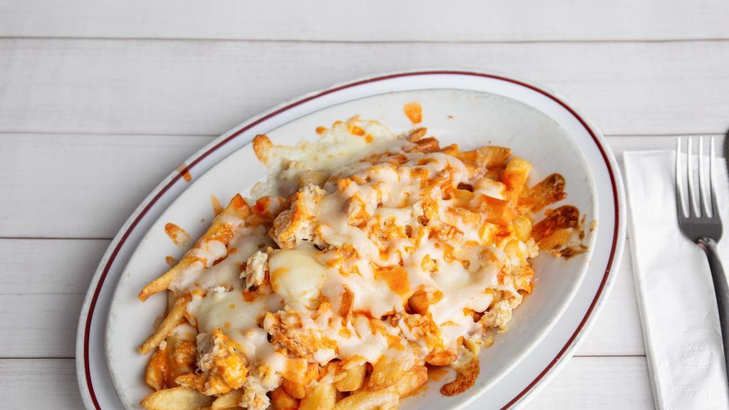 Buffalo Chicken Fries · Chopped grilled chicken with our homemade buffalo sauce and topped with melted crumbled Bleu cheese and mozzarella