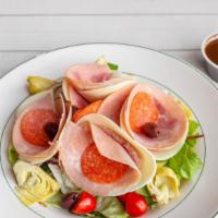 Antipasto Salad · Fresh greens, salami, capicola, Provolone cheese, pepperoni, tomatoes, red onions, artichoke...