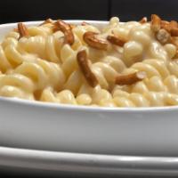 Mac & Cheese · Delicious mac and cheese with an option to add grilled buffalo chicken and blue cheese crumb...