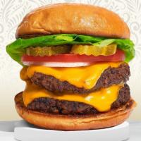 Double Cheese Trouble · Two Halal American beef patties topped with melted cheese, lettuce, tomato, onion, and pickl...