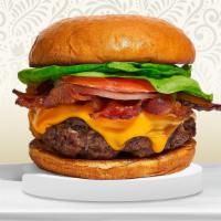 Don'T Go Bacon My Heart Burger · Halal American beef patty topped with melted cheese, multiple layers of crispy bacon, lettuc...
