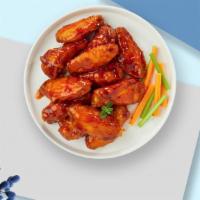 Bully Buffalo Wings · Crispy wings fried until golden brown, and tossed in buffalo sauce. Served with your choice ...
