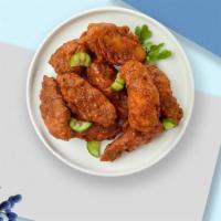 Hot In Wings  · Crispy wings fried until golden brown, and tossed in hot sauce. Served with your choice of d...