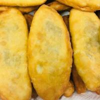 Aloo Pie (Fri & Sat Only) · A fried pastry stuffed with seasoned mashed potatoes (fri-sun only).