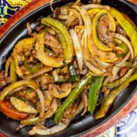 Fajitas · Marinated strips of your choice of grilled meat or veggies, bell peppers, onions, tomatoes a...