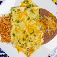 Enchiladas Mexicanas · Two flour tortillas filled with our traditionally slow cooked beef that is pulled and shredd...