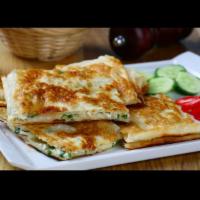 Gözleme (Turkish Flatbread) · Turkish flatbread recipe stuffed with Ground Beef, Feta Cheese or Spinach