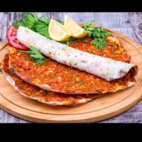 Lahmacun (3 Pcs) · Stack of 3 round, thin piece of dough topped with minced meat and minced vegetables and herb...