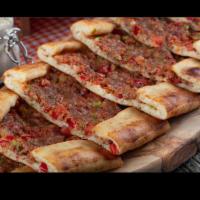 Kiymali Pide · Stuffed dough dish of ground beef, mozzarella cheese and peppers