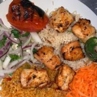 Chicken Shish Kebab · Marinated chicken (breast) cubes served with rice, shepherd salad and homemade bread