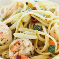 Shrimp Scampi · Garlic butter shrimp with fettuccine and peppers. Served with homemade bread