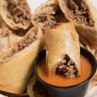 Cheesesteak Spring Rolls · with grilled onions, american cheese and our signature Cav's sauce on the side.