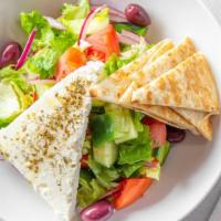 Greek Salad · Romaine lettuce, tomato, cucumber, onion, black olives, feta cheese, and Greek dressing, wit...