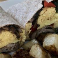 Garden Wrap · Scrambled eggs, sautéed spinach, red pepper and onions, and whole wheat wrap served with bre...