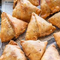 Vegetable Samosa 2Pcs · South Asian fried  pastry with a savory filling like spiced potatoes, onions, peas, and othe...