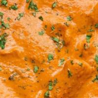 Butter Chicken · Boneless Tandori Chicken cooked with Tomato Creamy Sauce with butter. Comes with Aromatic Ba...